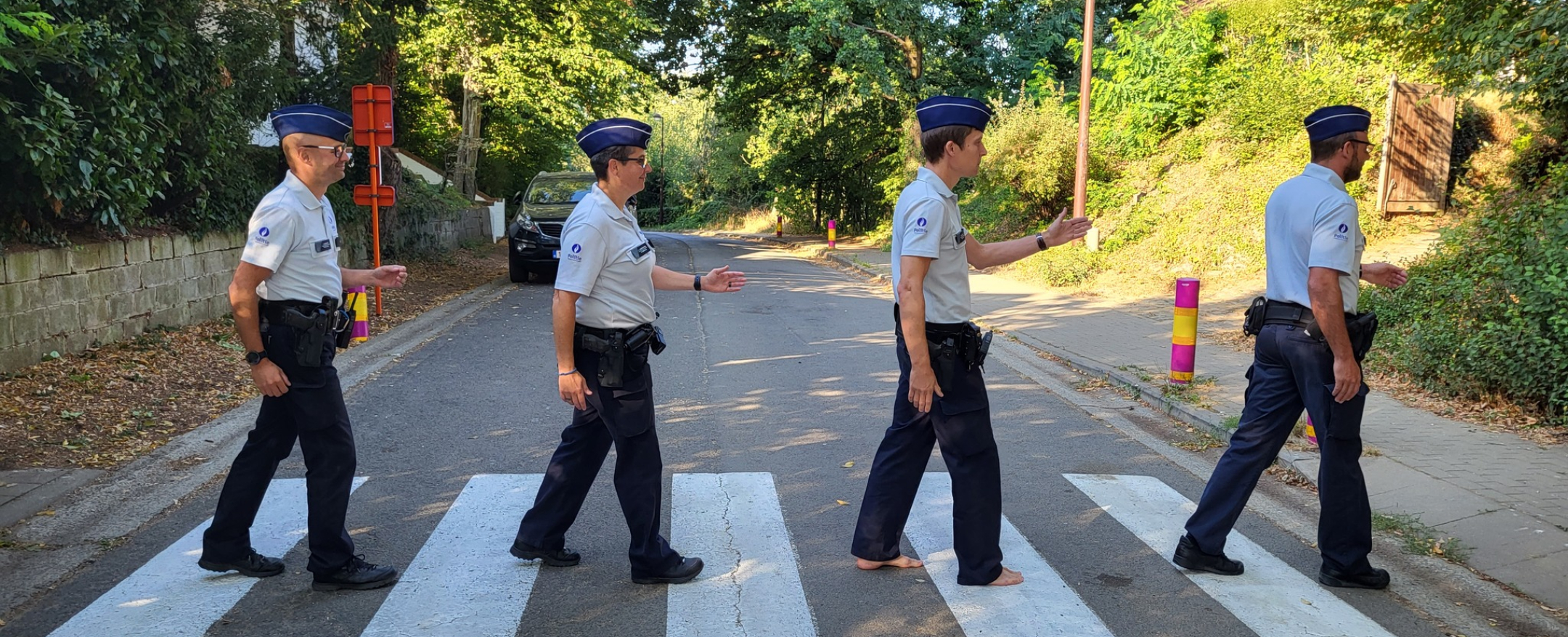 medewerkers op zebrapad